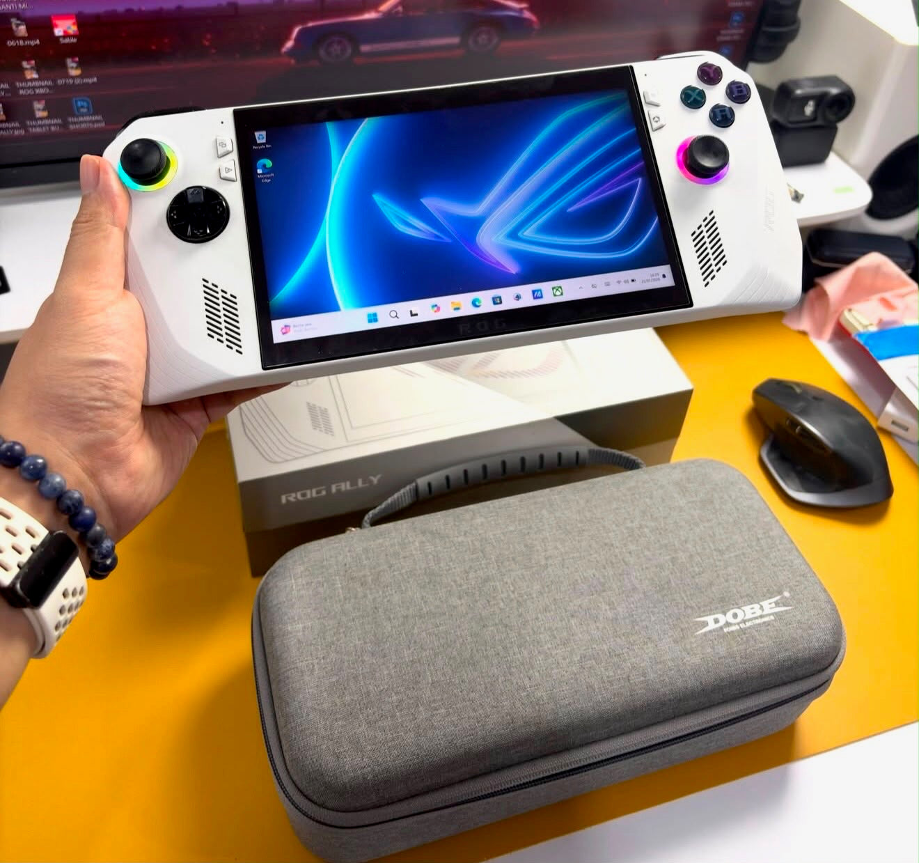 ASUS ROG Ally handheld gaming console with carry case