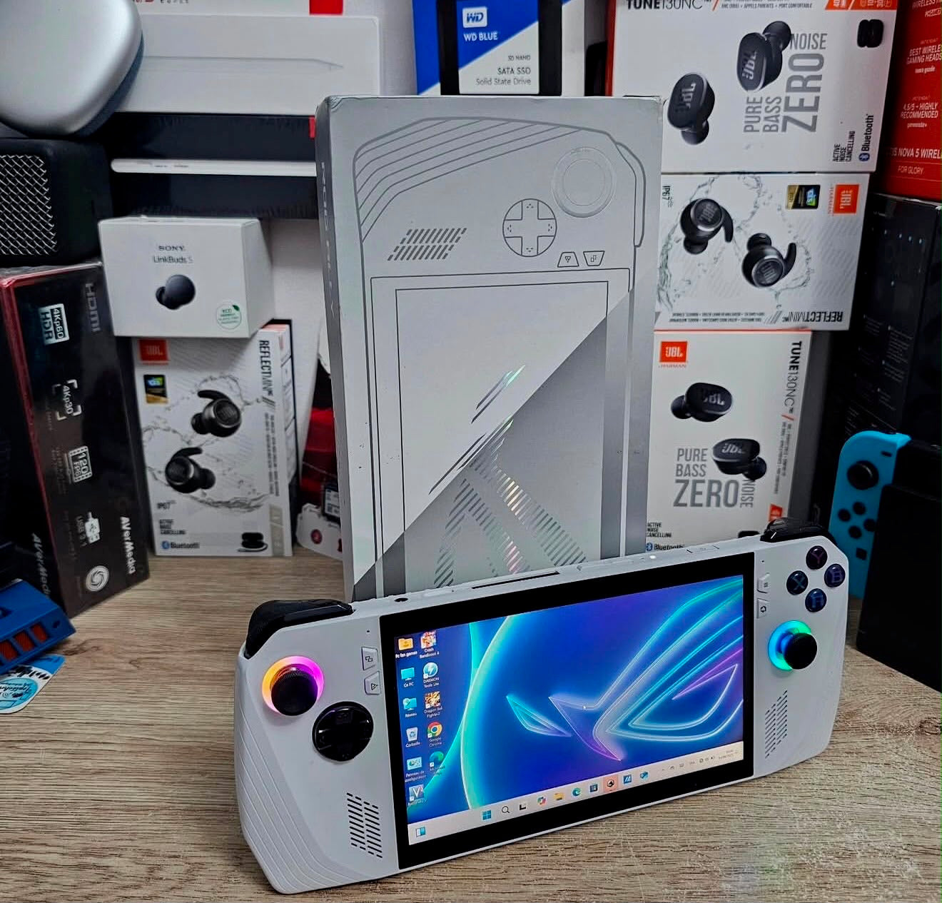 ASUS ROG Ally handheld gaming console with box and accessories